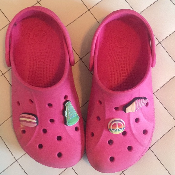 pink crocs with charms